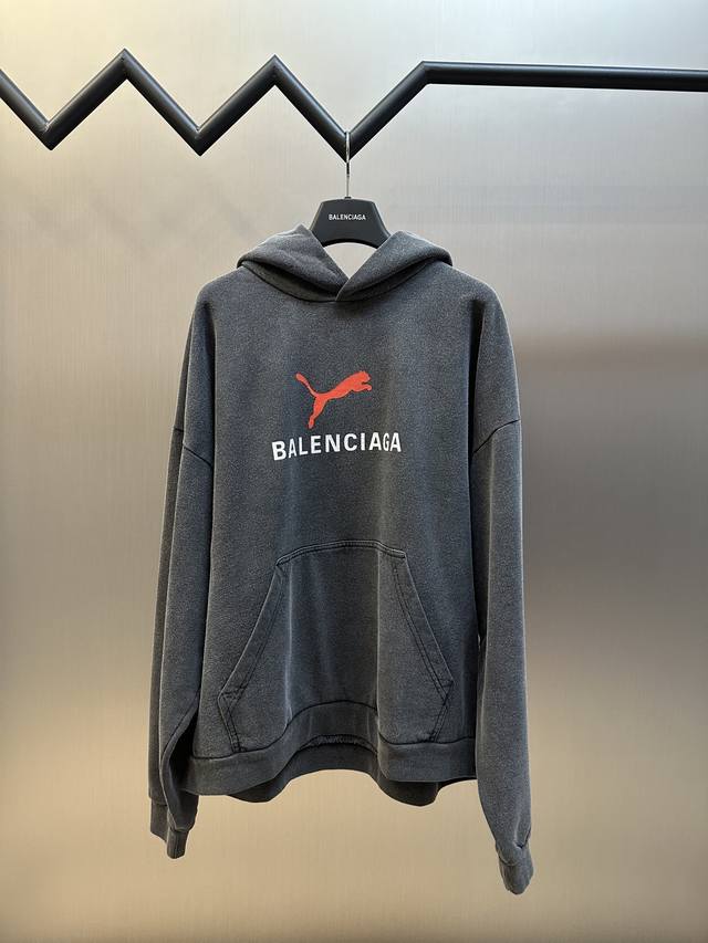 Balenciaga Puma Hoodie faded washed black hooded sweatshirt, no drawstring hood,