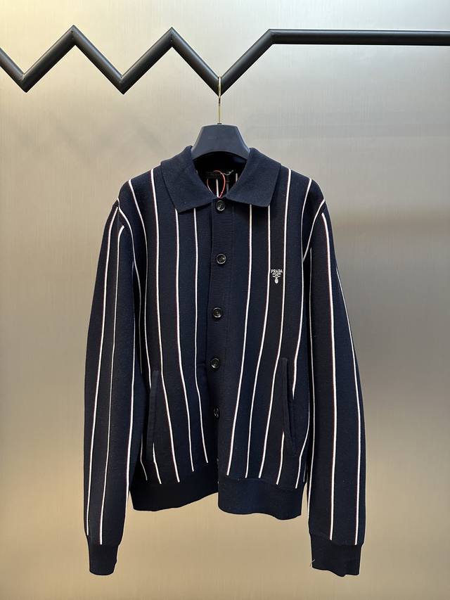 Prada striped embroidered long-sleeved sweater is custom-woven from a luxurious,