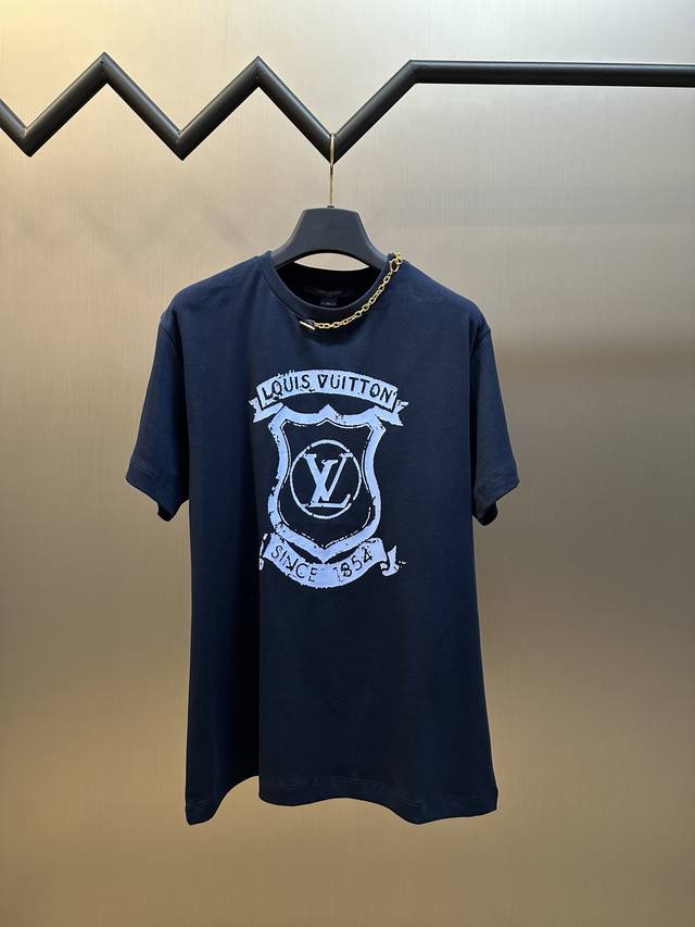 Lv Crest Print Short Sleeve T-shirt. Crafted from soft, breathable cotton, this
