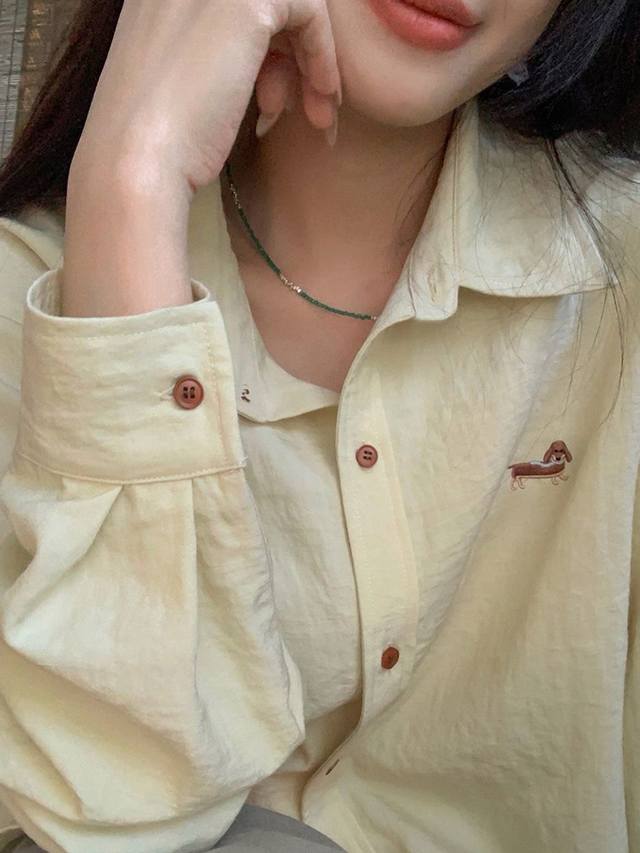 Thom Browne Tb dog embroidered apricot sun-protective shirt and jacket. The crea