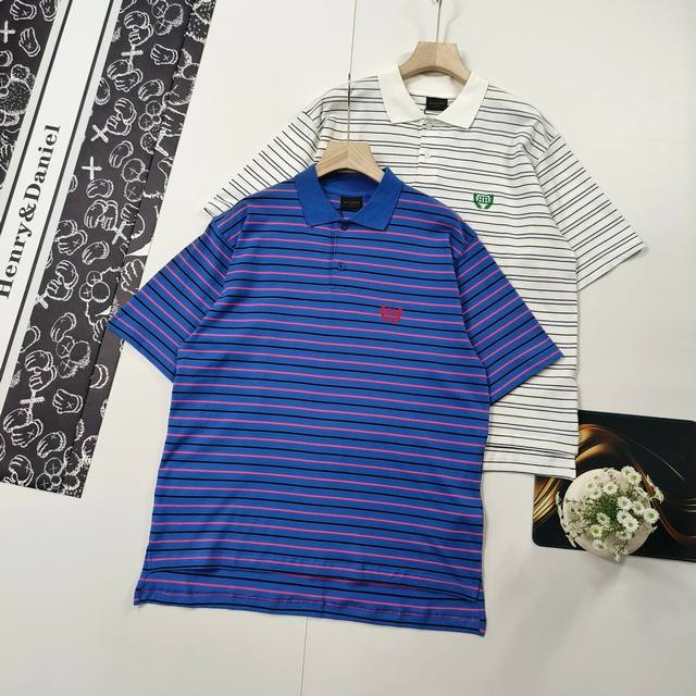 sizes Xs-L. Featured Balenciaga polo shirt with simple stripes and wheat ear emb