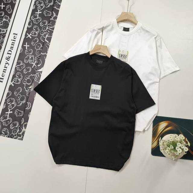 sizes XS-L. Featured Balenciaga short-sleeved T-shirt with 520 printed label. Th