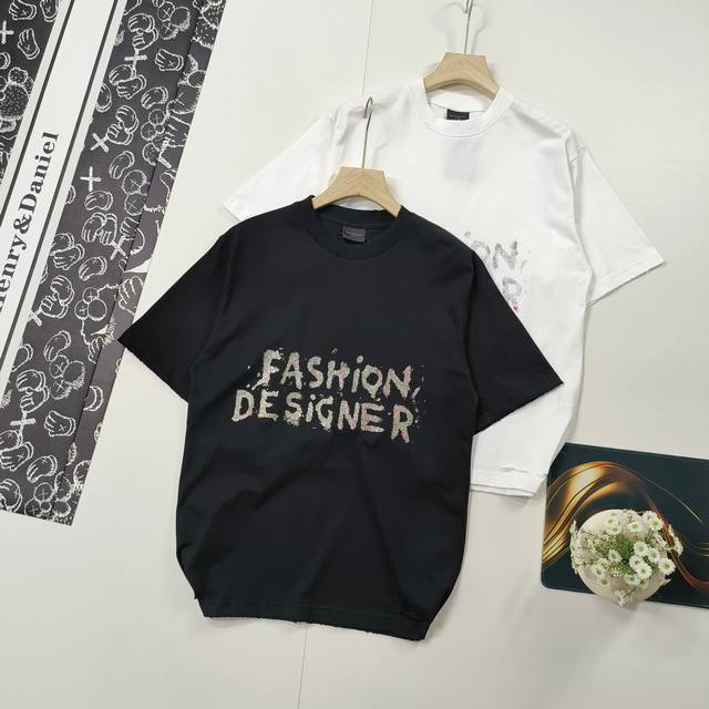 sizes XS-L. Featured Balenciaga short-sleeved T-shirt with a distressed, distres