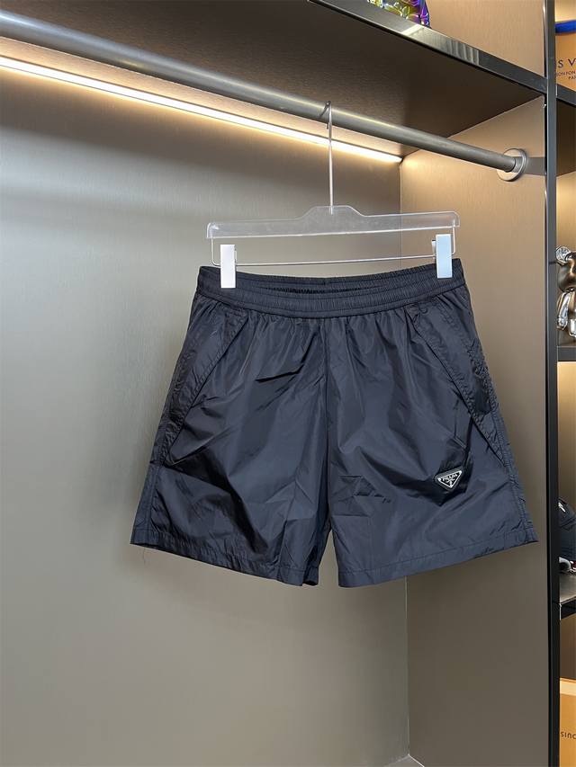 Prada 2025Ss new triangle-labeled casual couple's loose-fitting 4-inch shorts, t