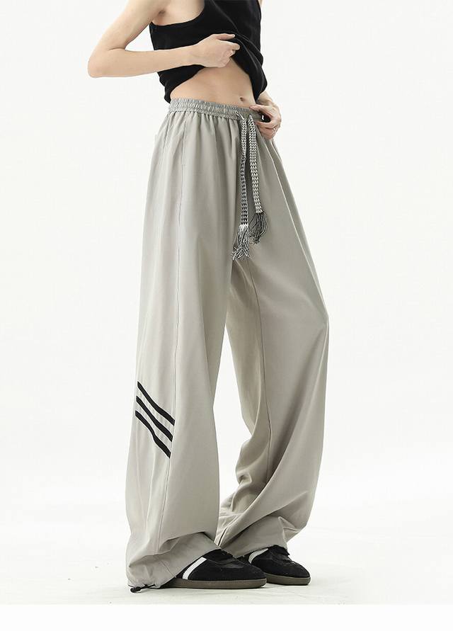 is available for the unisex three-stripe ice silk casual trousers with 3D embroi