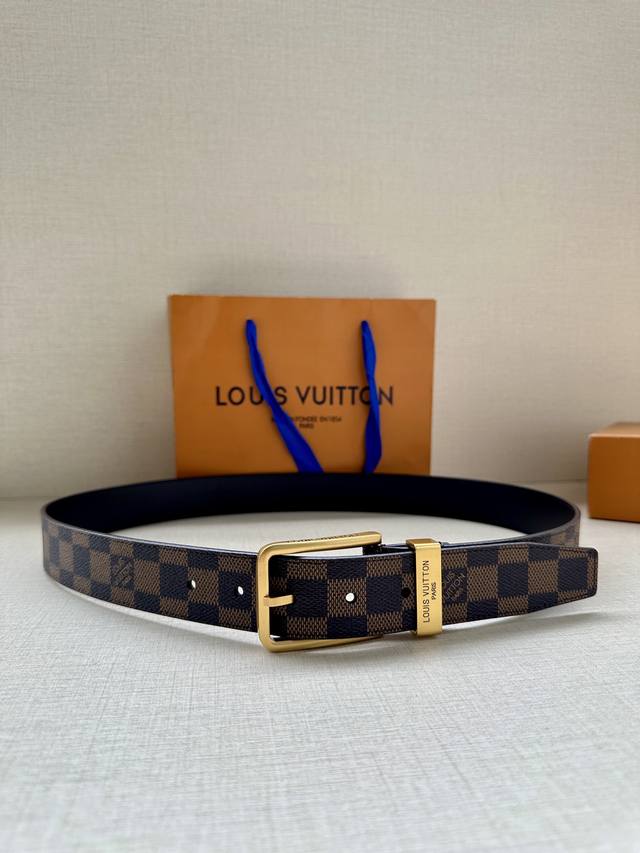 offers a 3.4" wide Saint Germain belt in Monogram Eclipse canvas with a metal ri