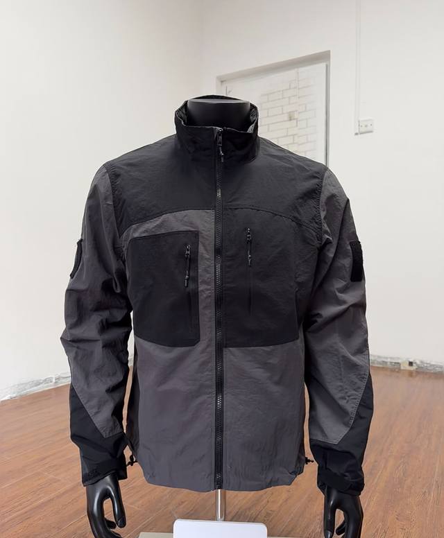 Arc'Teryx System_A Hangdog Jacket, a unisex softshell jacket with a patchwork de