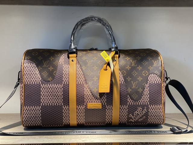 Lv Travel Bag Virgil Abloh has teamed up with Japanese design genius Nigo to rei
