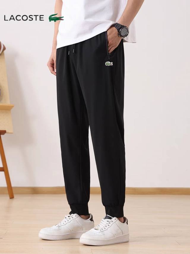 Lacoste's new outdoor ice silk pants are unisex. These thin, trendy, loose, brea