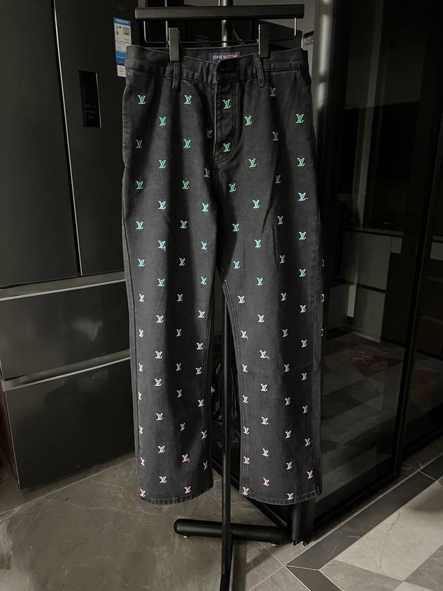 The next day, Louis Vuitton gradient embroidered monogram jeans in black. Crafte