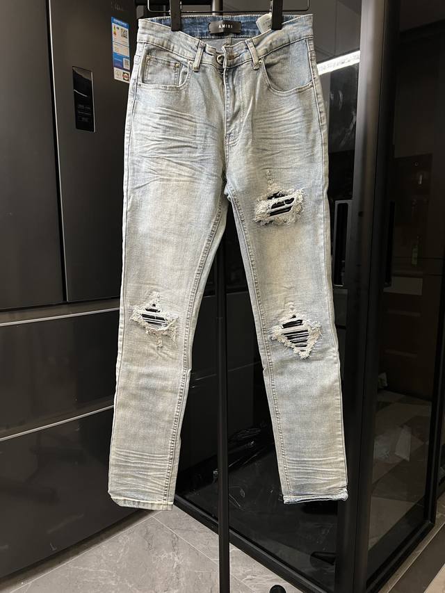 Amiri Mx1 25Ss Knee-cut Holes and Black Leather Washed Jeans Blue Size: 28 30 32