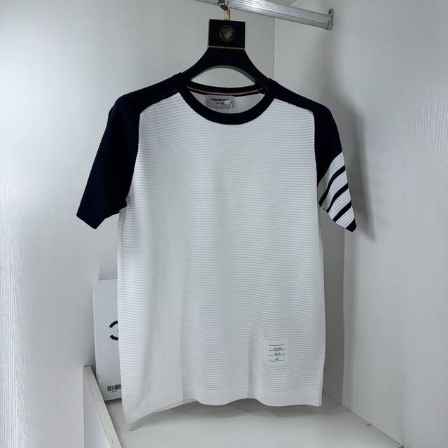 Thom Browne's updated four-bar sweater is inspired by the original 1980s vintage
