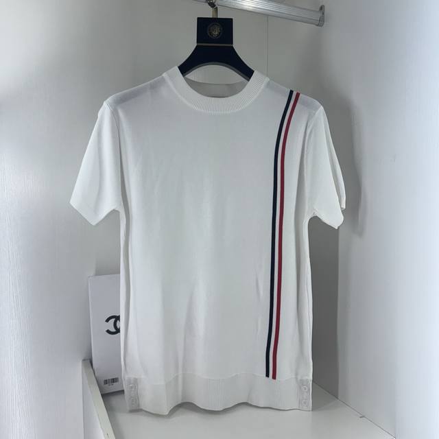 Thom Browne's updated four-bar knitted polo shirt is inspired by the original 19