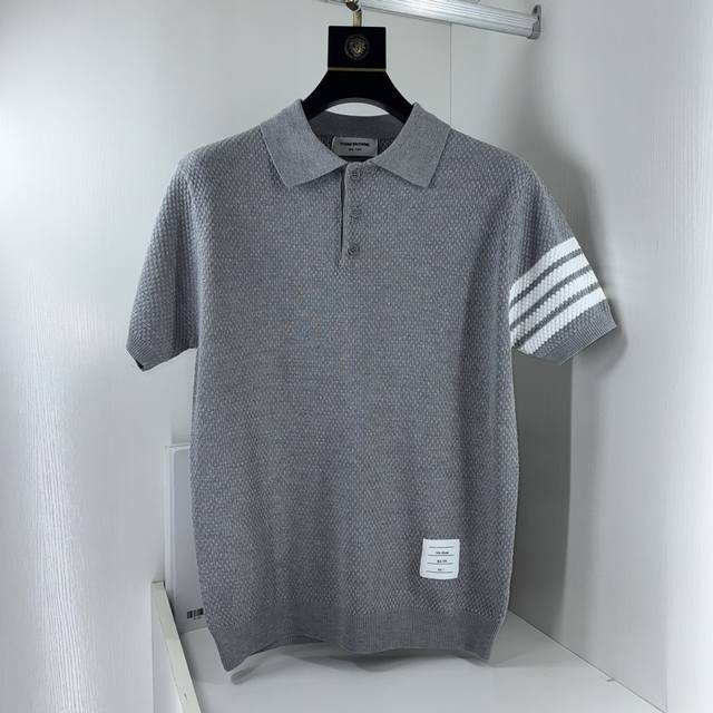 Thom Browne's updated four-bar knitted polo shirt is inspired by the original 19