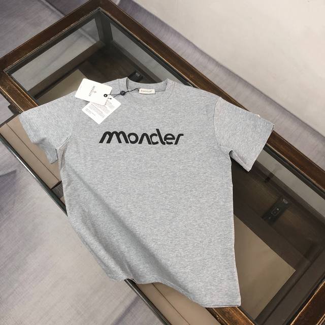 Mon*Cler's latest 2025 couple's T-shirt with a brand logo print and a crew neck.