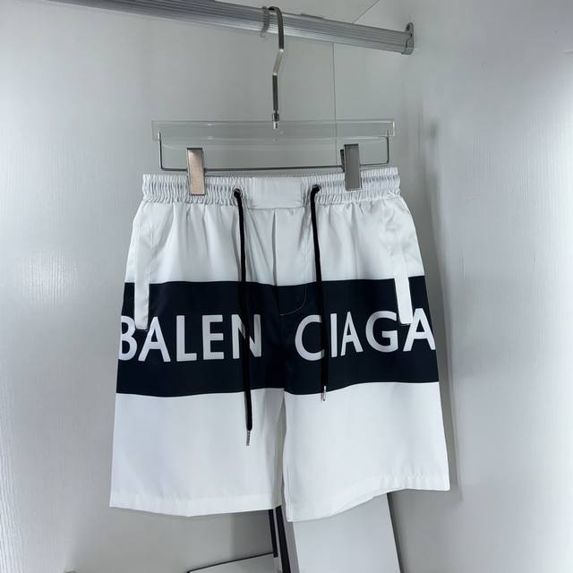 Balenciaga, the latest summer beach shorts, custom-made with branded cords, impe