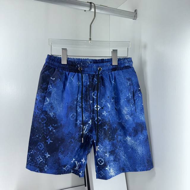 Louis Lv, the latest summer arrival, features inner mesh beach shorts with custo