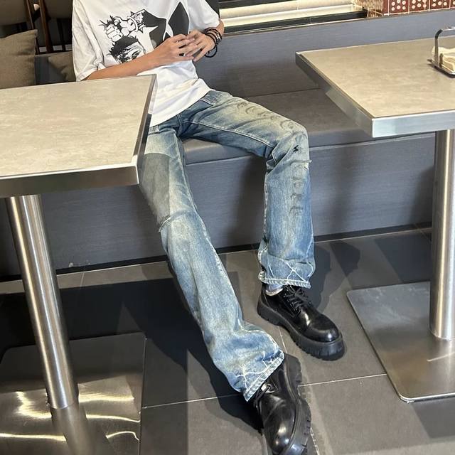 style number 3005, Undercover 06T, Eye Cargo Flare jeans with distressed, damage