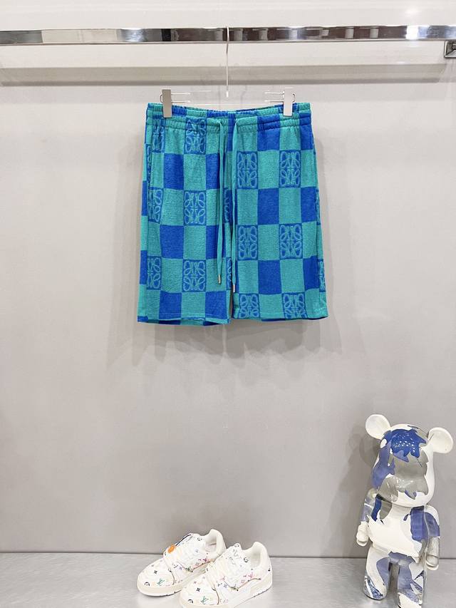Loewe custom terry fabric shorts with checkerboard pattern and contrasting color