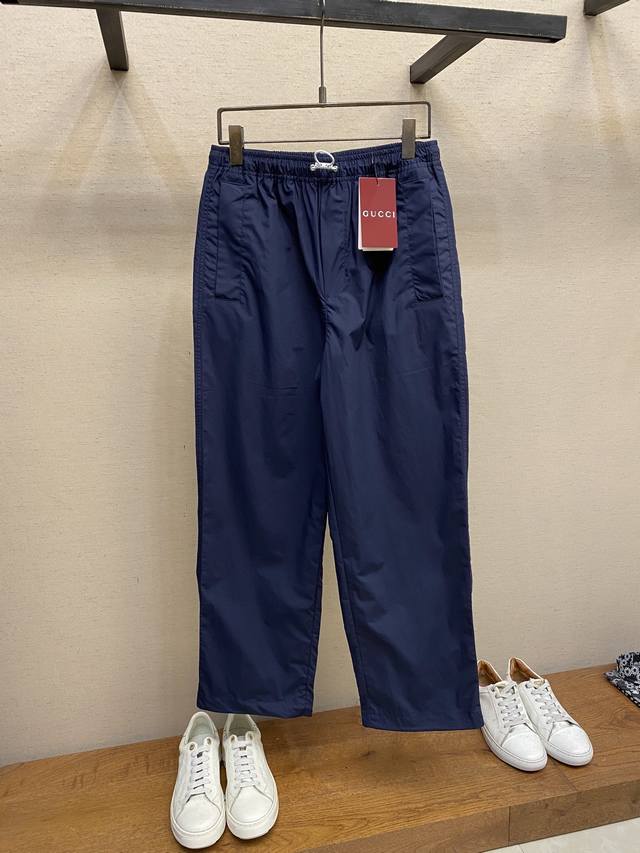 Gucci monogrammed cotton poplin trousers. Fabric: Made from cotton fibers in a p