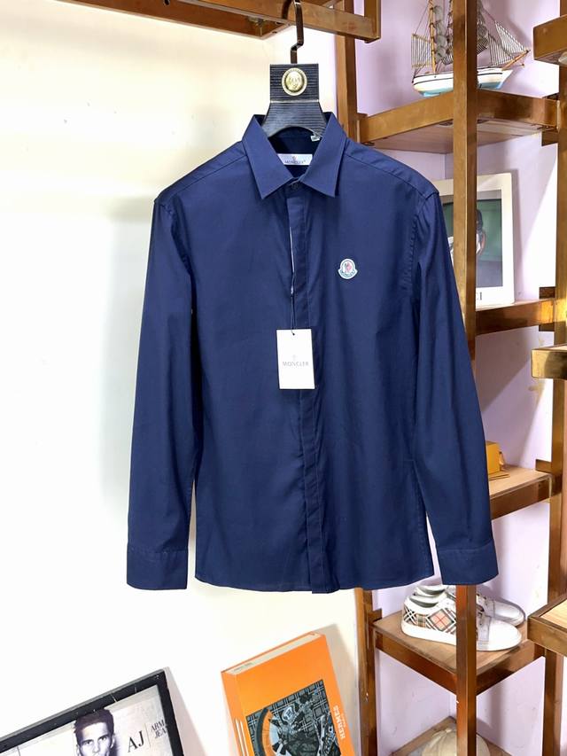 Moncler's premium business-class, original long-sleeved shirt. This high-end, cu