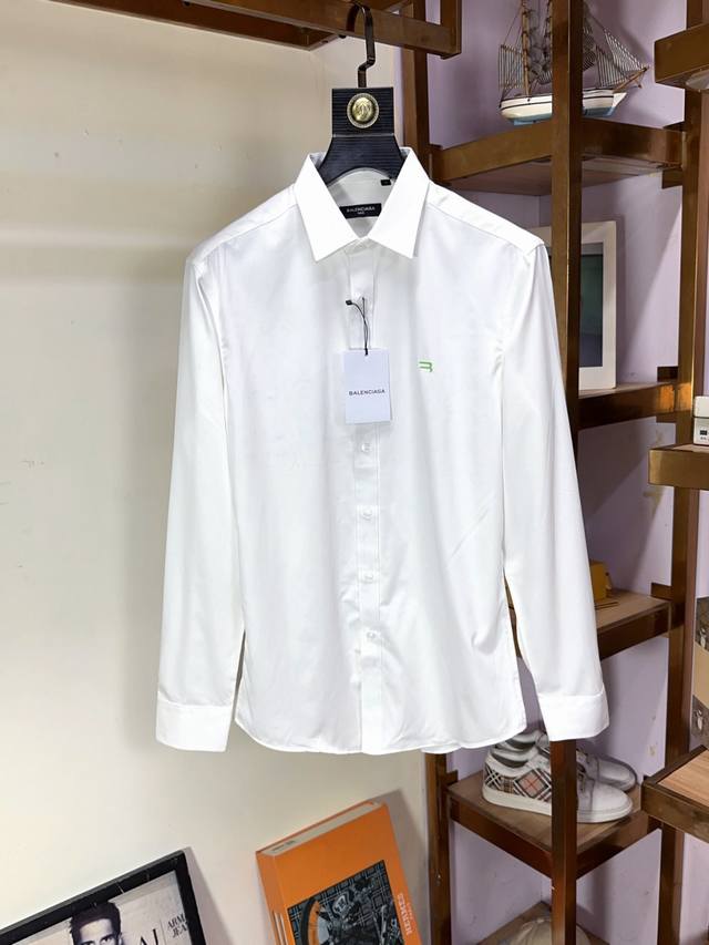 Balenciaga's premium business-class, original long-sleeved shirt. This high-end,