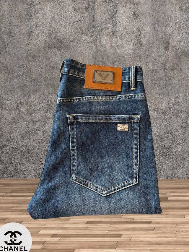 Armani's new spring/summer jeans are a hot seller at the counter. They share a u