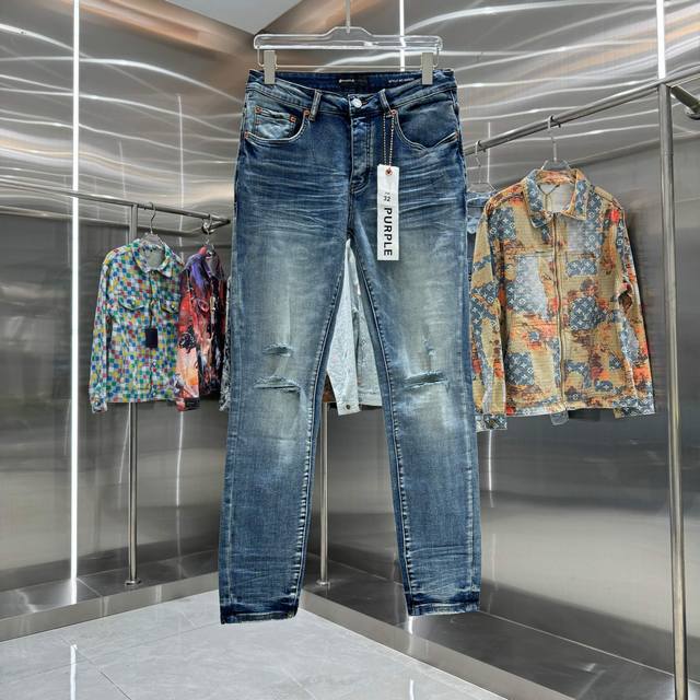 D Purple Brand ripped street style slim-fit stretch jeans. Color: blue. Sizes: 3
