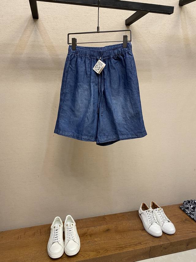 Loewe, old-money style lightweight 11-an washed blue denim shorts. Elastic draws