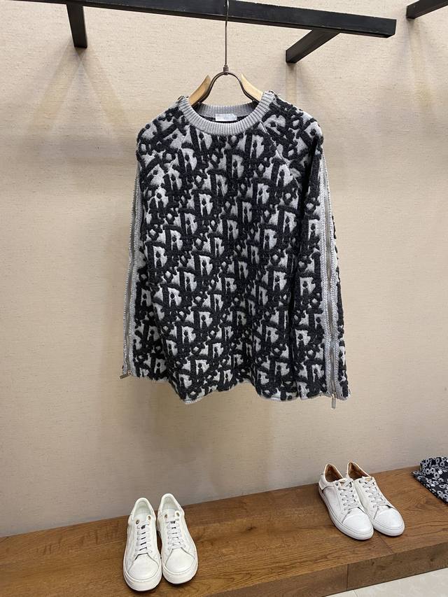 Dior Wool Blend Jacquard Sweater This sweater is crafted from a white sheep and