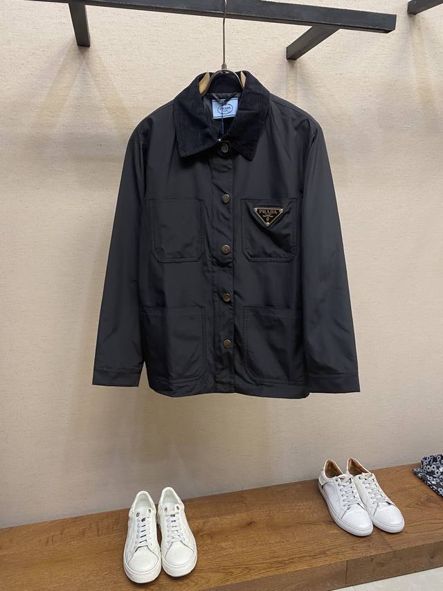 Prada large badge snap button shirt jacket, featuring a loose fit and regular cu
