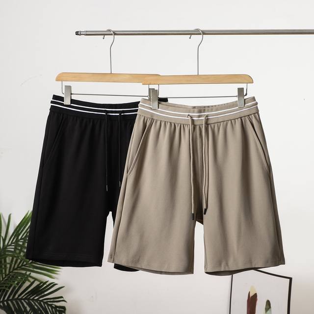 Prada: 2025Ssprada back pocket metal triangle label shorts recommended high vers