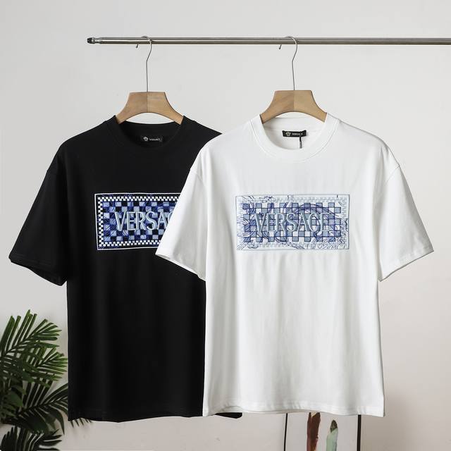 a top-quality Versace embroidered short-sleeved T-shirt, purchased and patterned