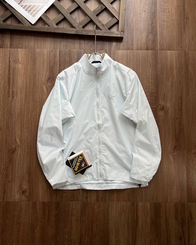 Original custom 1:1 thin, stand-up collar jacket. Arc'Teryx counter-branded Sola