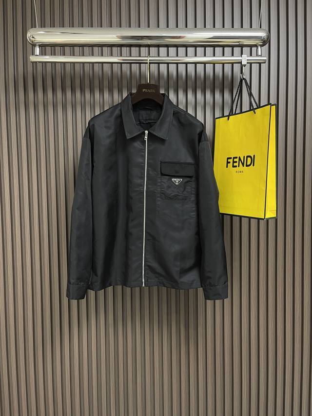 Prada, recycled nylon lapel jacket, the fabric is made of the brand's iconic rec