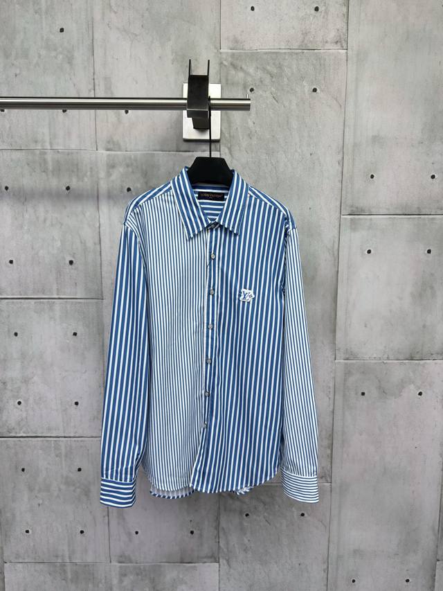Louis Vuitton striped patch long-sleeved shirt is crafted from custom cotton fab