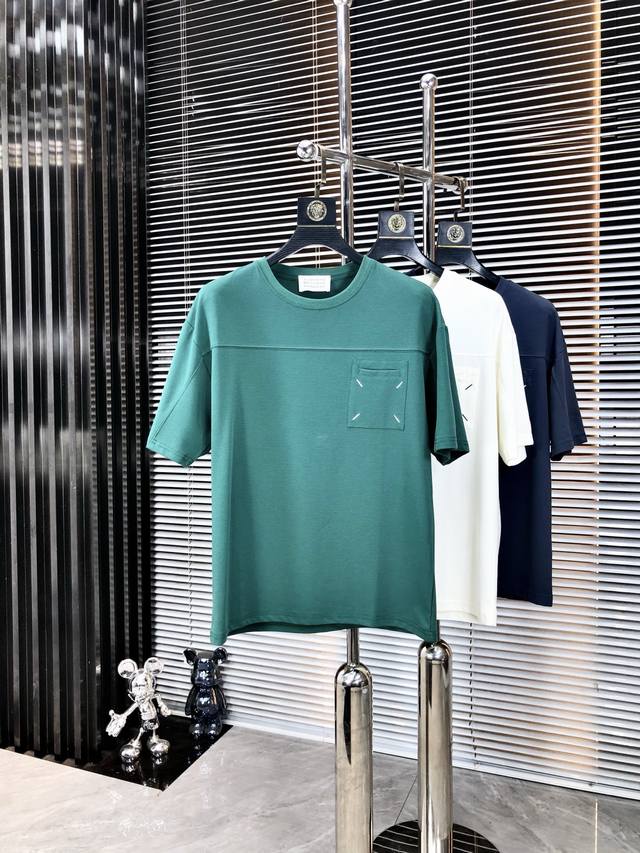 Margiela. A stylish, round-neck, short-sleeved, high-end custom-made, versatile
