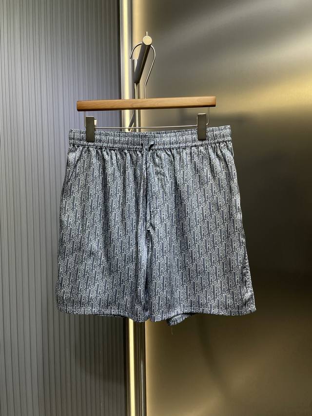 Dior Oblique Print Shorts in Silk Twill. These shorts showcase the iconic Obliqu