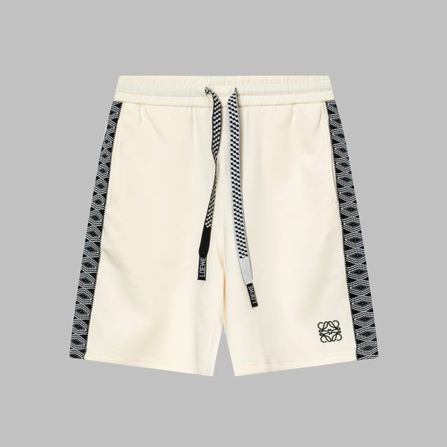 Loewe shorts with logo embroidery and webbing stitching. Made of high-quality co