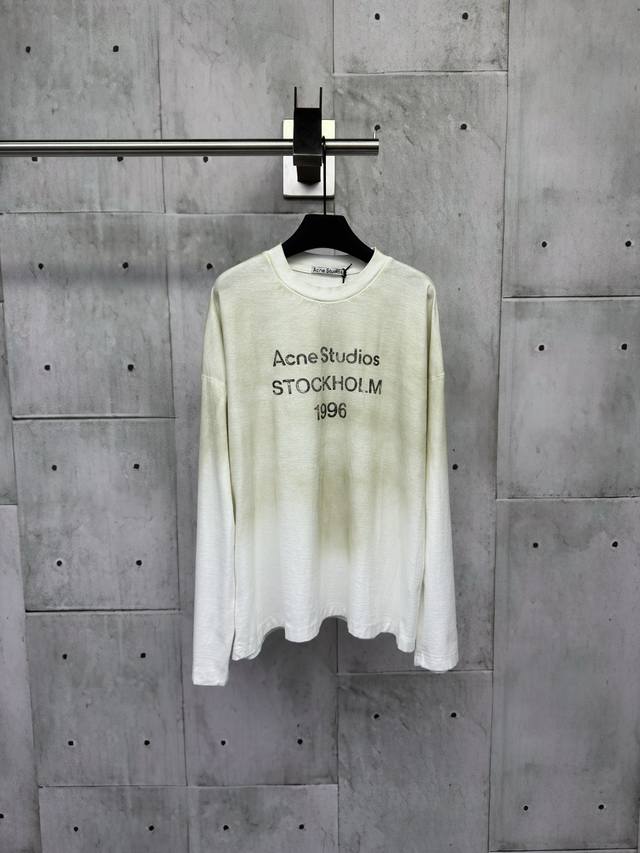 Acne Studios 1966 mud-dyed, washed, and distressed long-sleeved top. Made from u