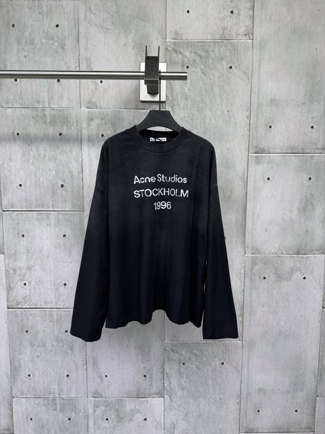 Acne Studios 1966 mud-dyed, washed, and distressed long-sleeved top. Made from u