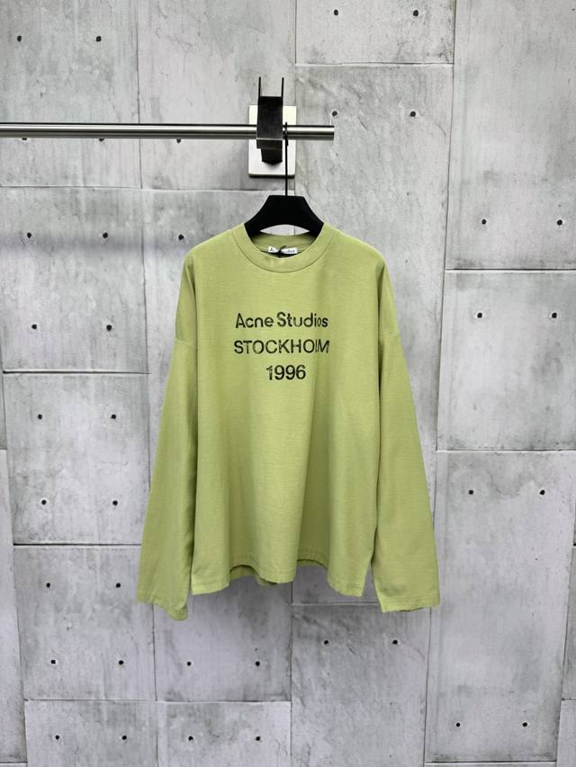 Acne Studios 1966 mud-dyed, washed, and distressed long-sleeved top. Made from u