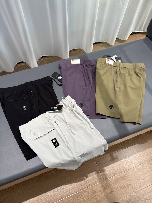 Descente Training Series Tough Woven Sun Protection Men's Training Shorts. Color