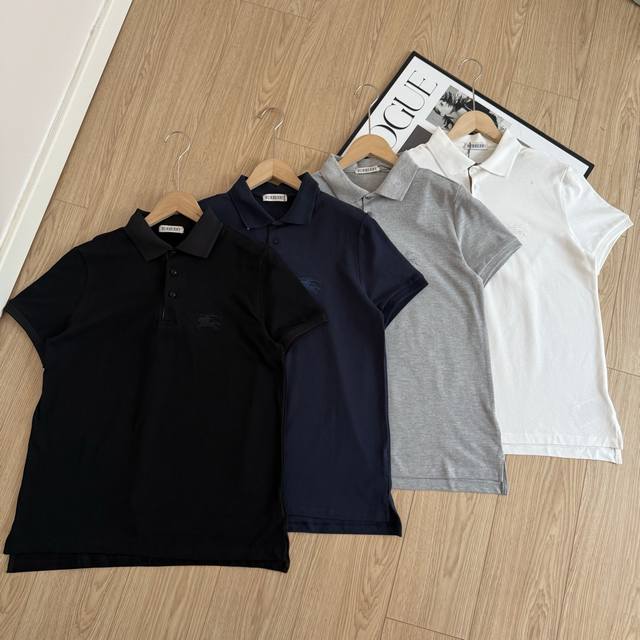 Burberry's four-color, classic warhorse logo embroidered short-sleeved Polo is a