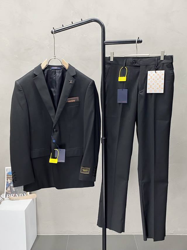 suit. Single-breasted jacket and trousers. Louis Vuitton's new spring/autumn sui