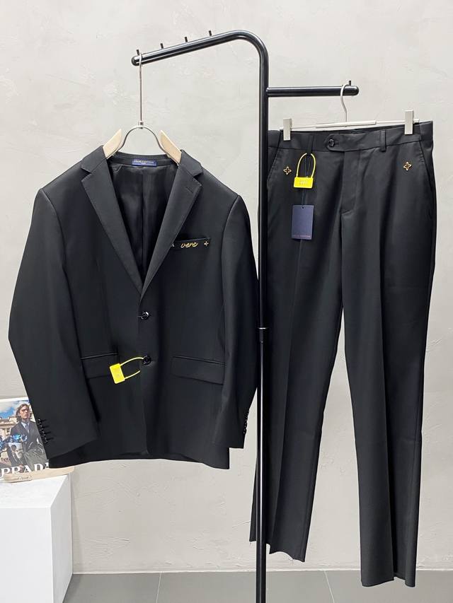 suit. Single-breasted jacket and trousers. Louis Vuitton's new spring/autumn sui