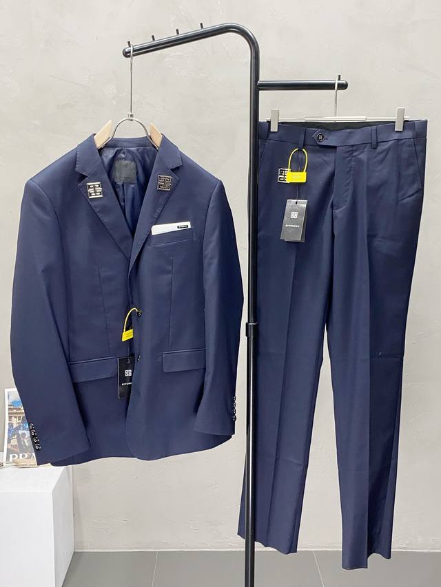 suit. Single-breasted jacket and trousers. Givenchy's new spring/autumn suit. Th