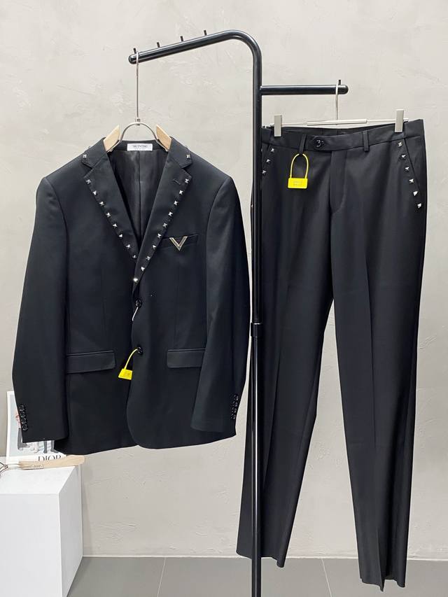 suit. Single-breasted jacket and trousers. Valentino's new spring/autumn suit. T