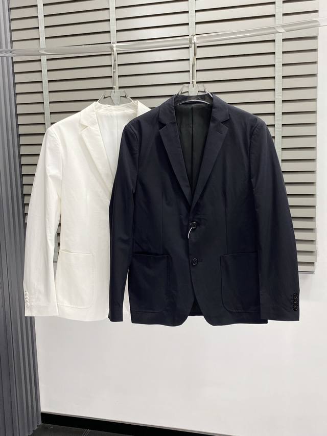 a new Prada exclusive, simple, casual blazer. Made from imported, original polye