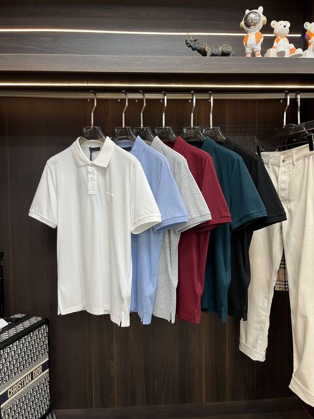 Featured: Prada 25Ss New Cotton Polo Shirt with Six-Color Triangle Logo Embellis